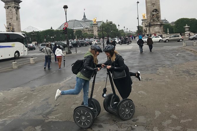 Paris: Experience Segway Top Highlights Small Group 2 Hours - Arc de Triomphe and the Eiffel Tower Stop: Two Big Icons, Short Pause Time