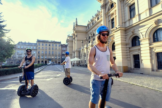 Segway Tour Warsaw: Full Tour - 3-Hours of Magic! - Castle Square icons: Sigismund’s Column, the Mermaid, and the Barbican wall