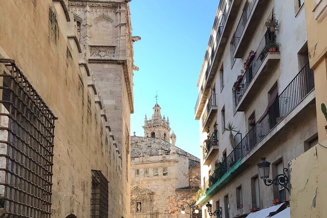 Valencia Old Town Private Tour by Bike or Electric Ride - Plaça de l’Almoina and the Roman Kilometre 0 spot